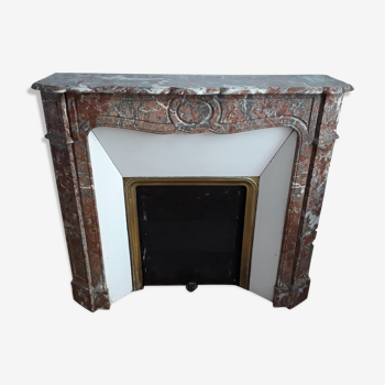 Ancient red marble fireplace