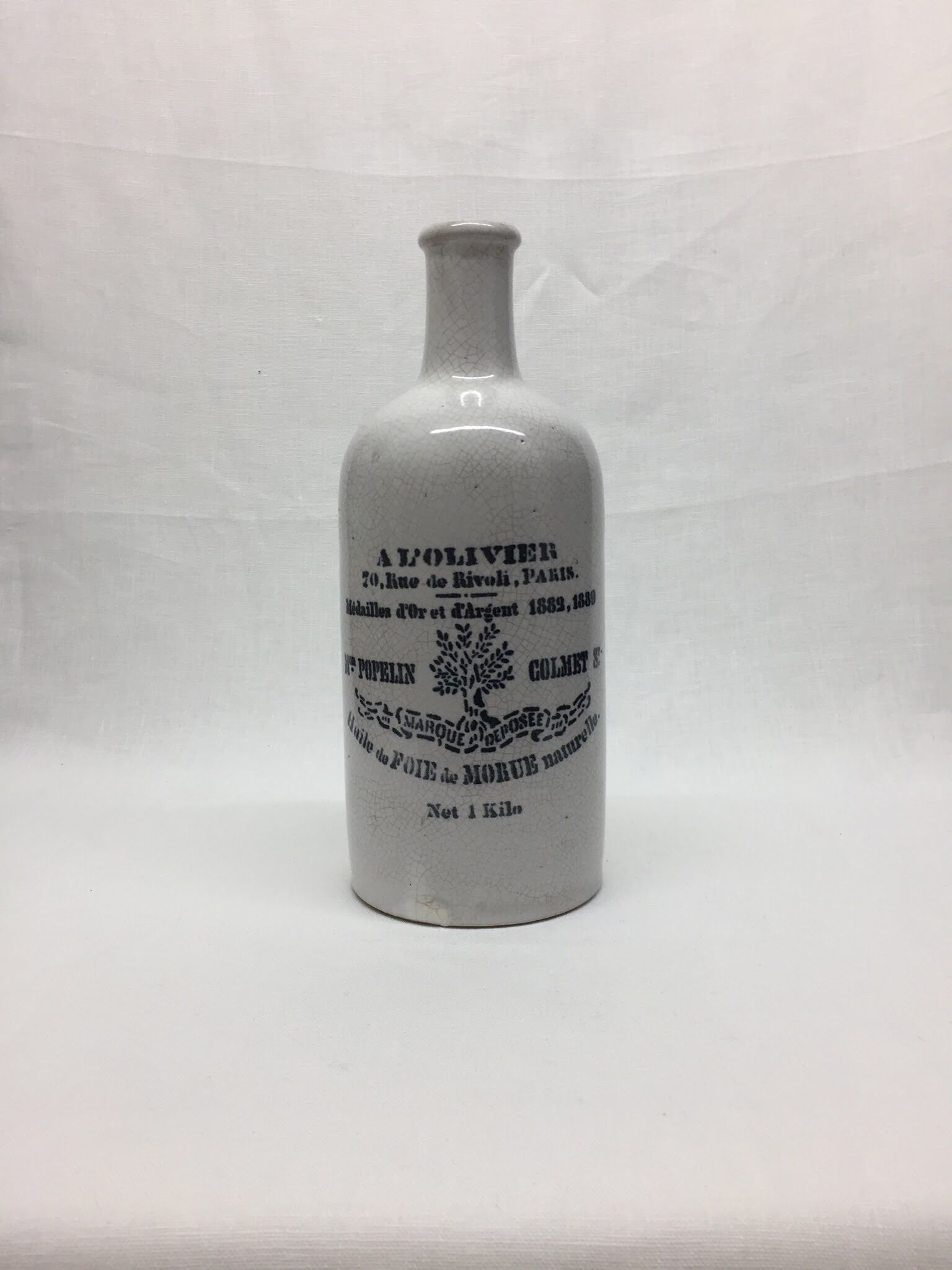Enamelled with L'olivier stoneware bottle