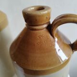 Duo of stoneware decanter bottles