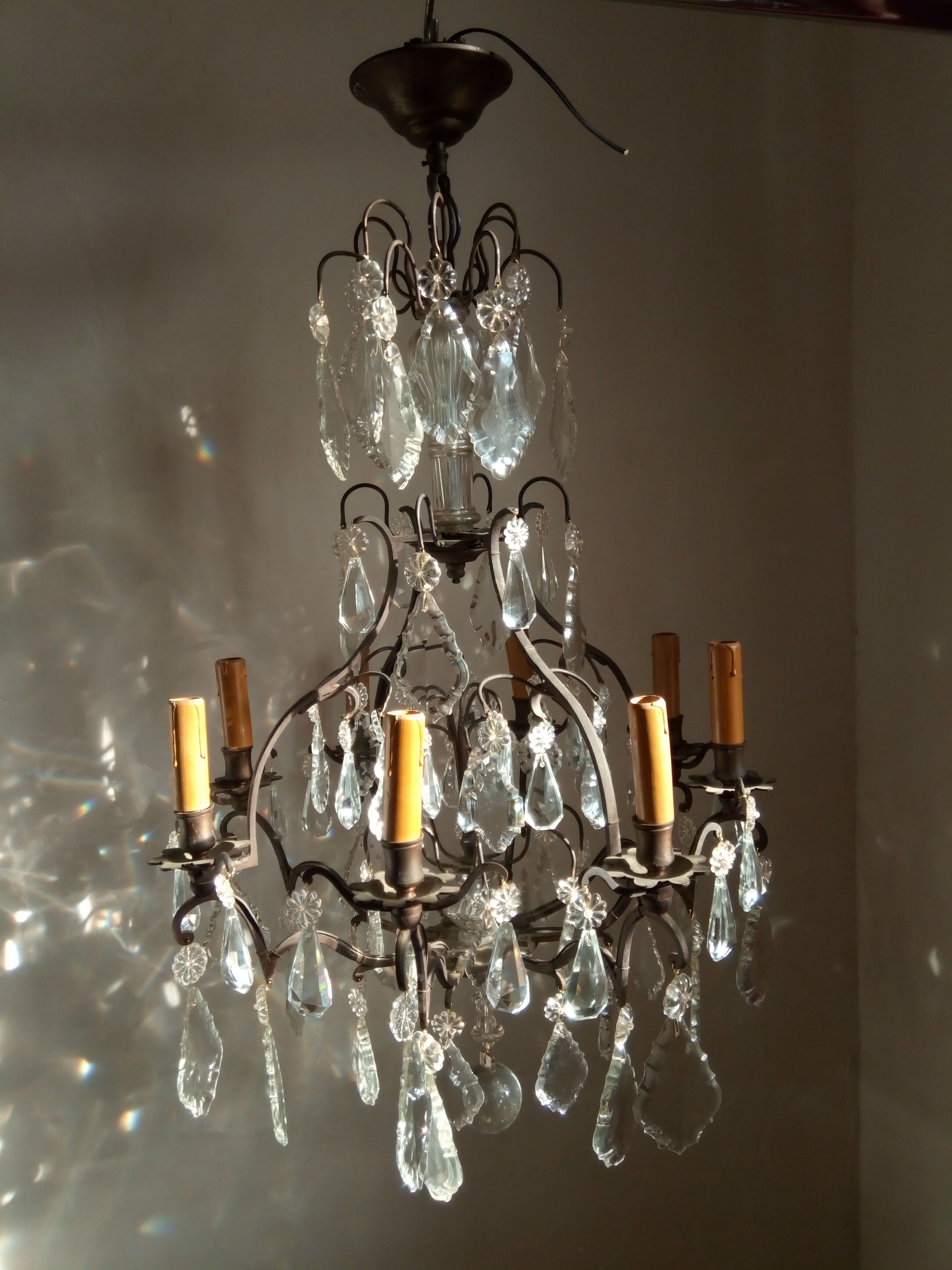 Old chandelier with tassels, bronze and crystal, 8 lights. Louis XV style.