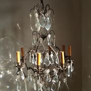 Old chandelier with tassels, bronze and crystal, 8 lights. Louis XV style.