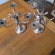 Ercuis pair of candlesticks model Cheverny in silver-plated metal with hunting horn decoration.