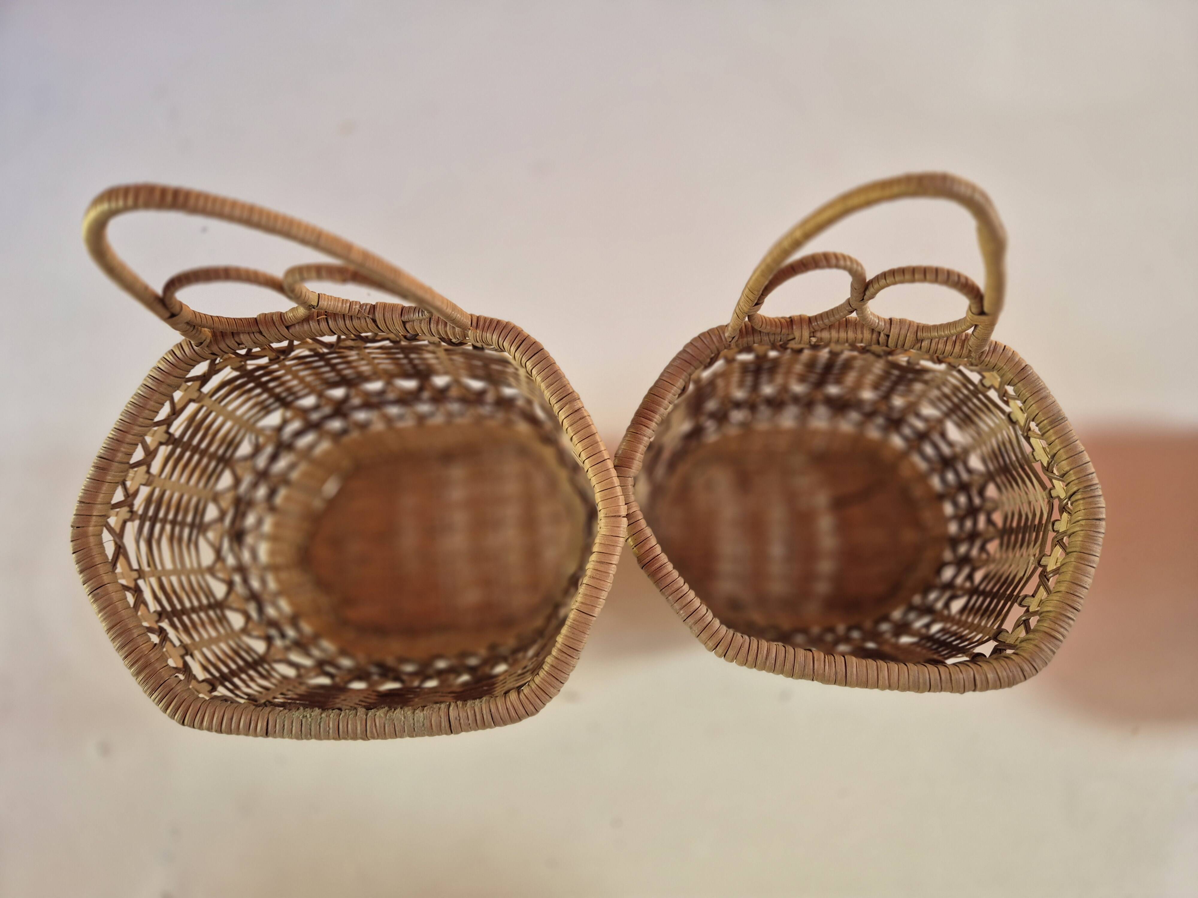 set of 2 vintage hanging rattan baskets