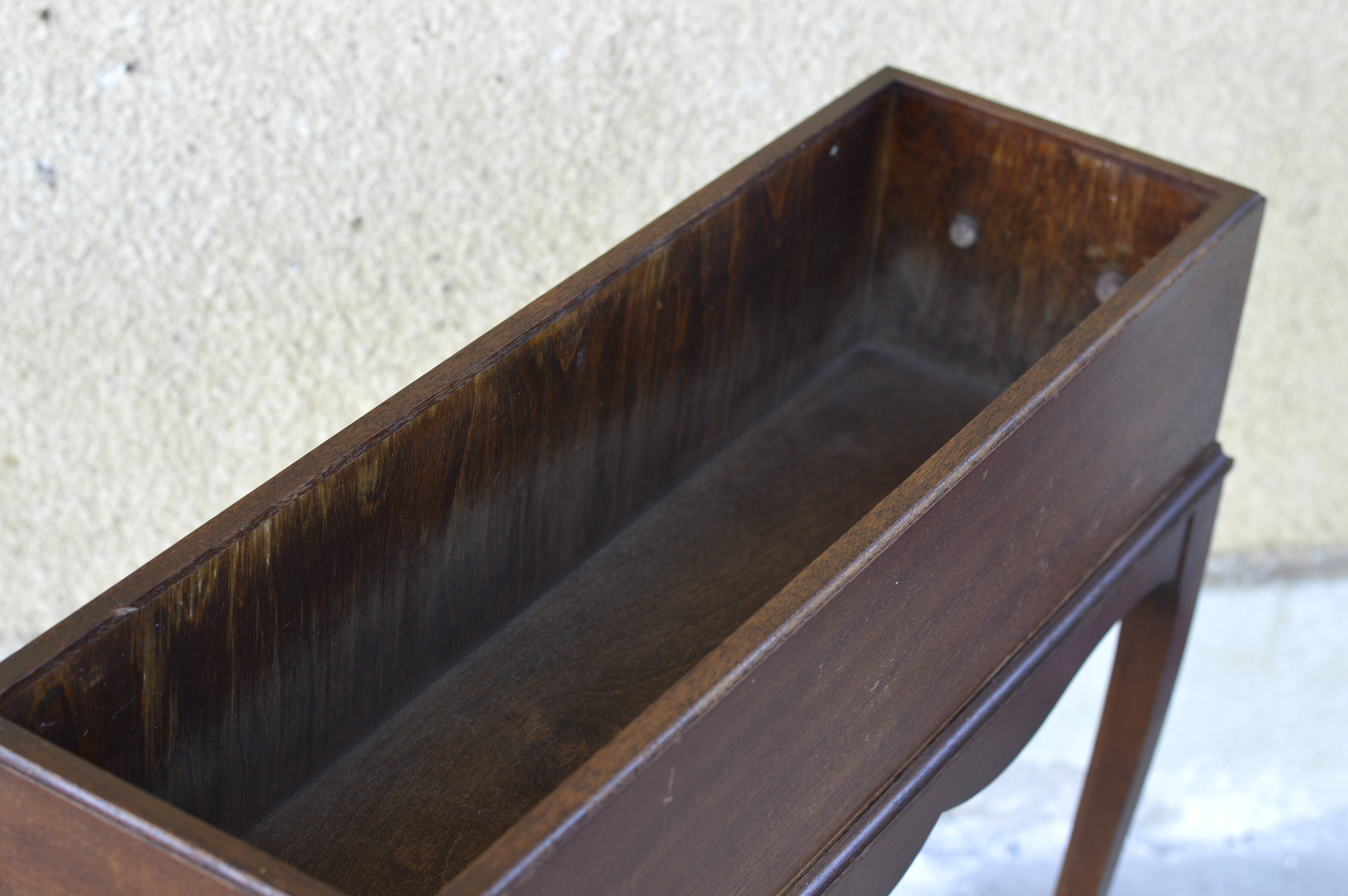 Elegant mid-century teak planter with tray.
