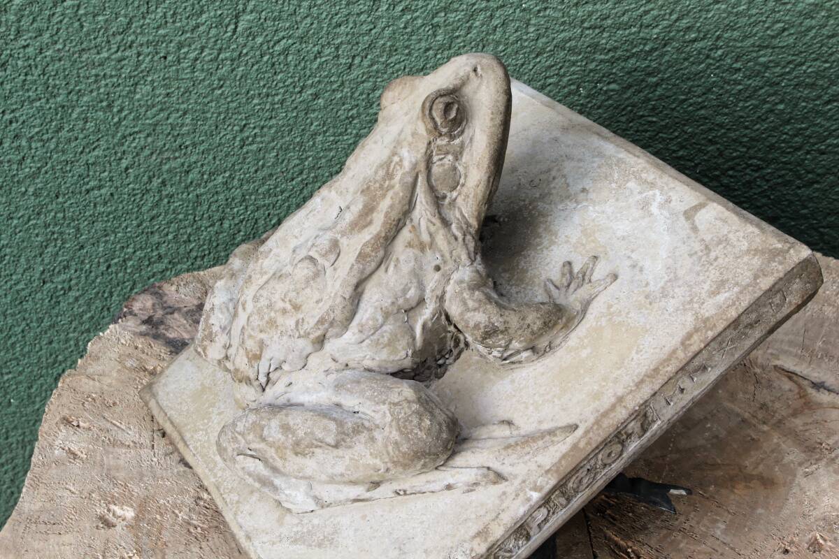 Cement frog, signed A. Picot