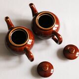 2 brown glazed ceramic teapots