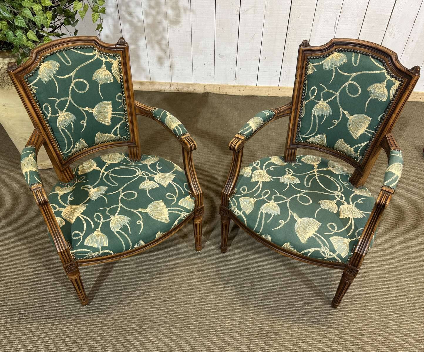 Pair of Louis XVI style armchairs in beech from the 19th century.