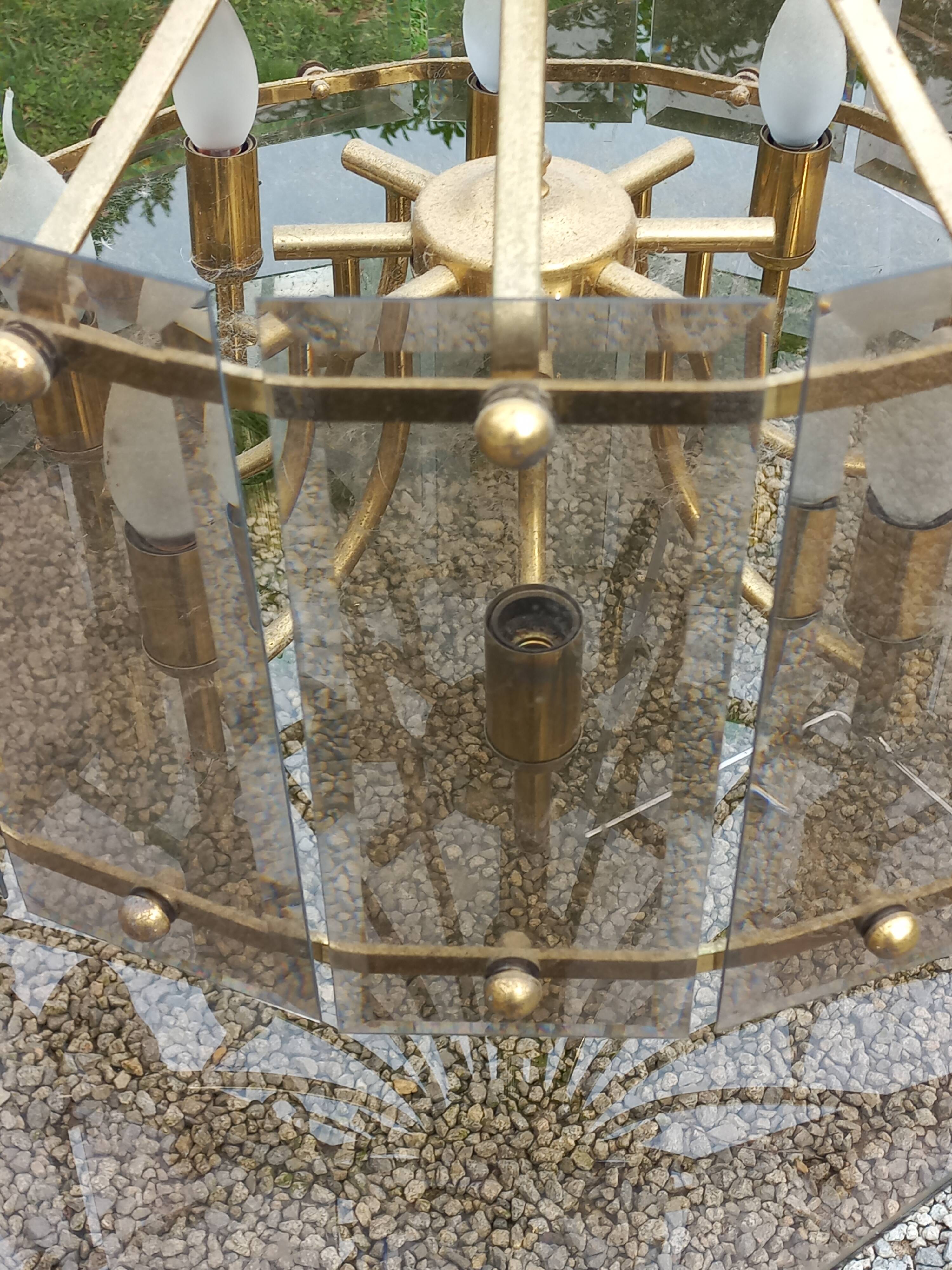 70s designer chandelier with smoked glass plates and gold metal frame