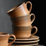 4 sandstone cups and saucers