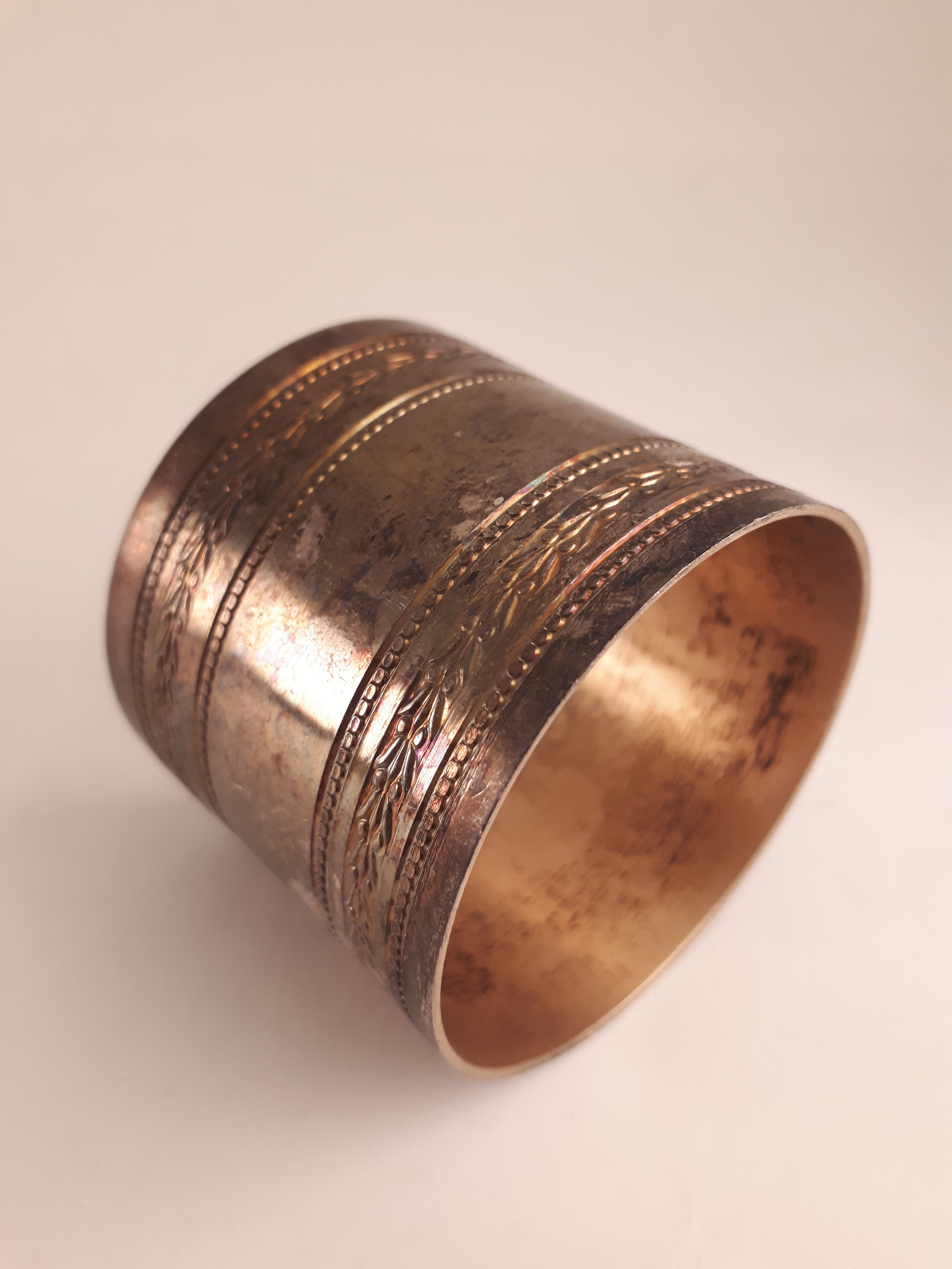 Round old silver metal towel