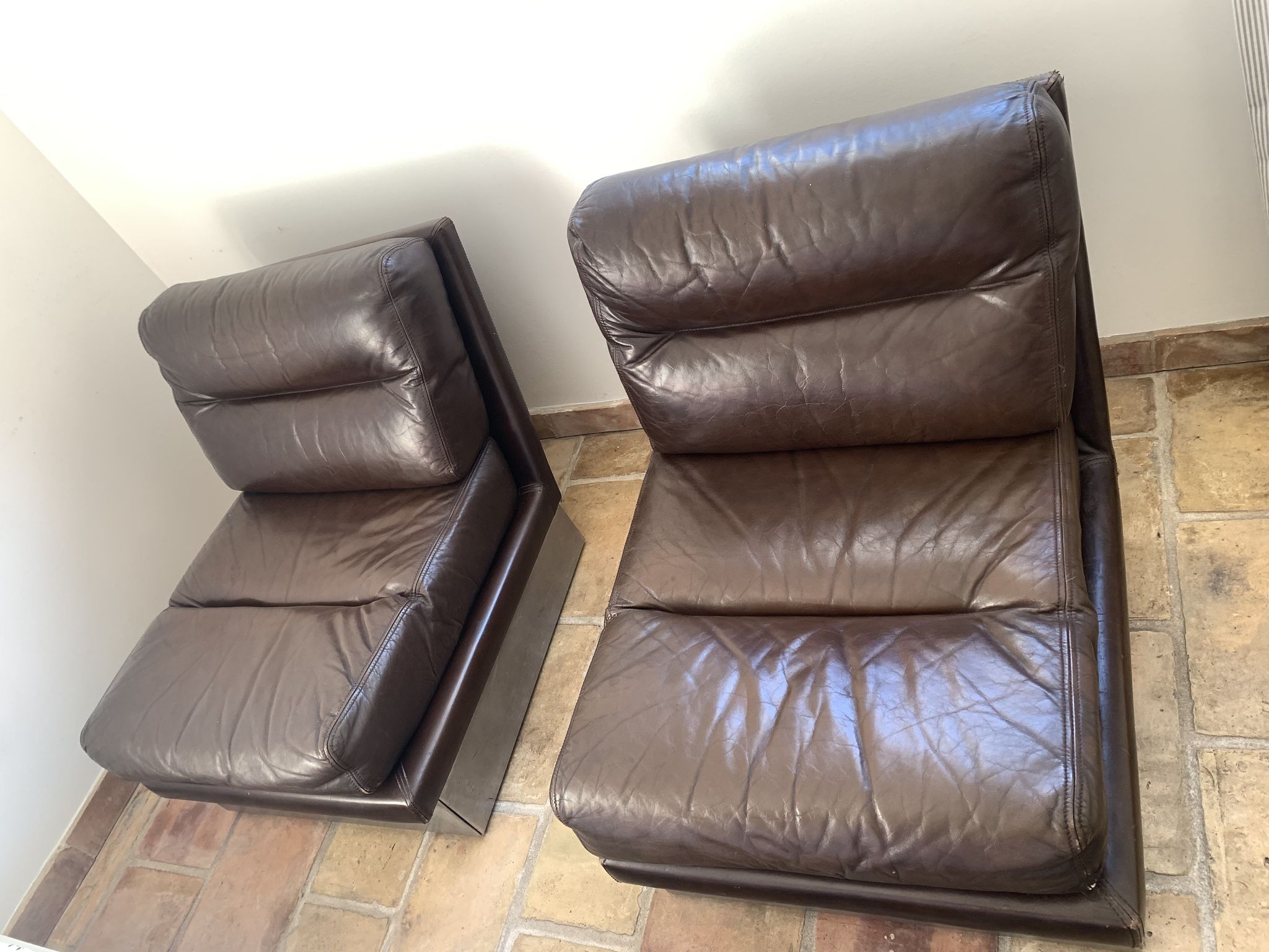 Duo of armchairs in leather 1960 rock and bobois