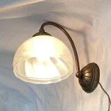 Brass wall light with a glass globe dimension: height -21cm- width -27cm-