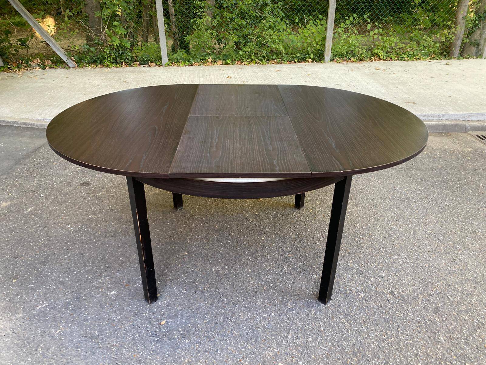 Contemporary round extendable Scandinavian dining table in wenge 1990