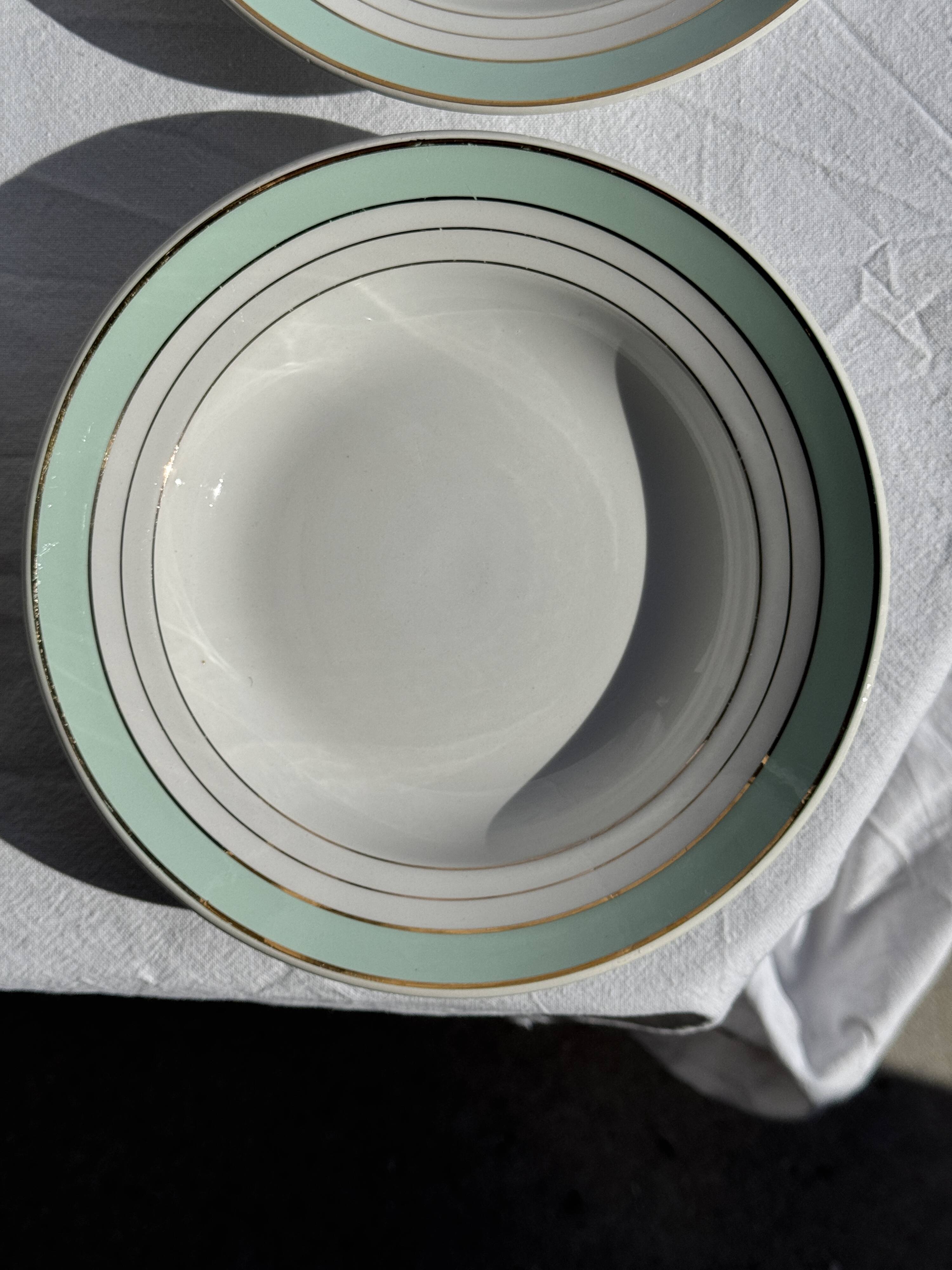Set of 8 antique turquoise deep plates with a gold rim D22.5