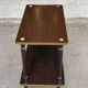 Double-tray rosewood serving trolley on gilded casters