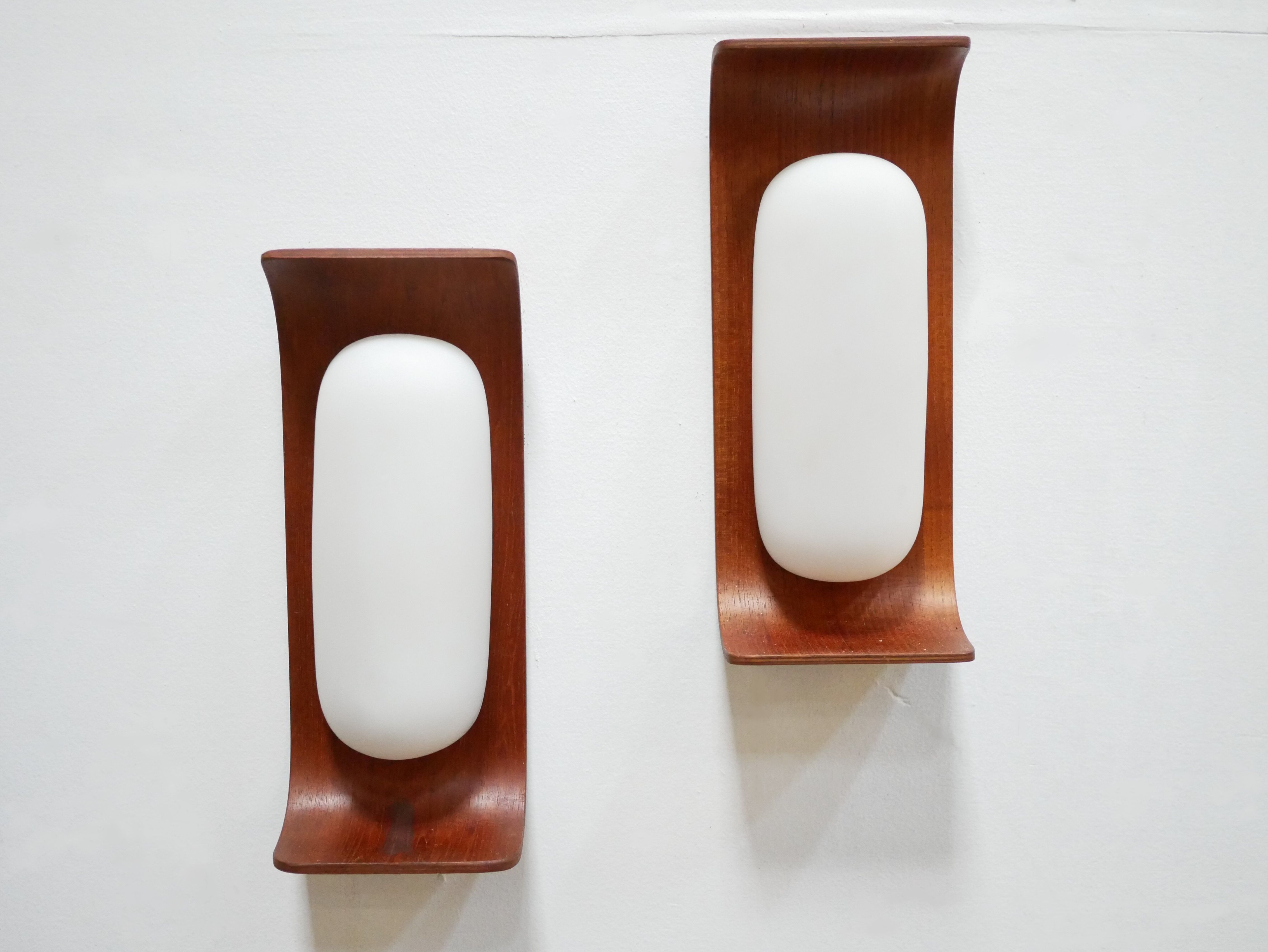 Pair of teak and opaline wall lamps by Goffredo Reggiani