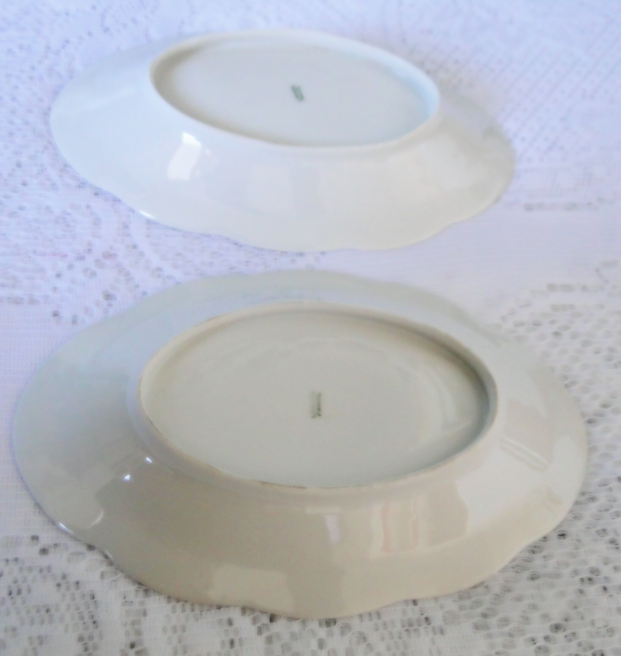 Lot 2 old porcelain raviers limoges decor petites roses on a white background