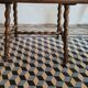 Brutalist coffee table with turned wooden legs