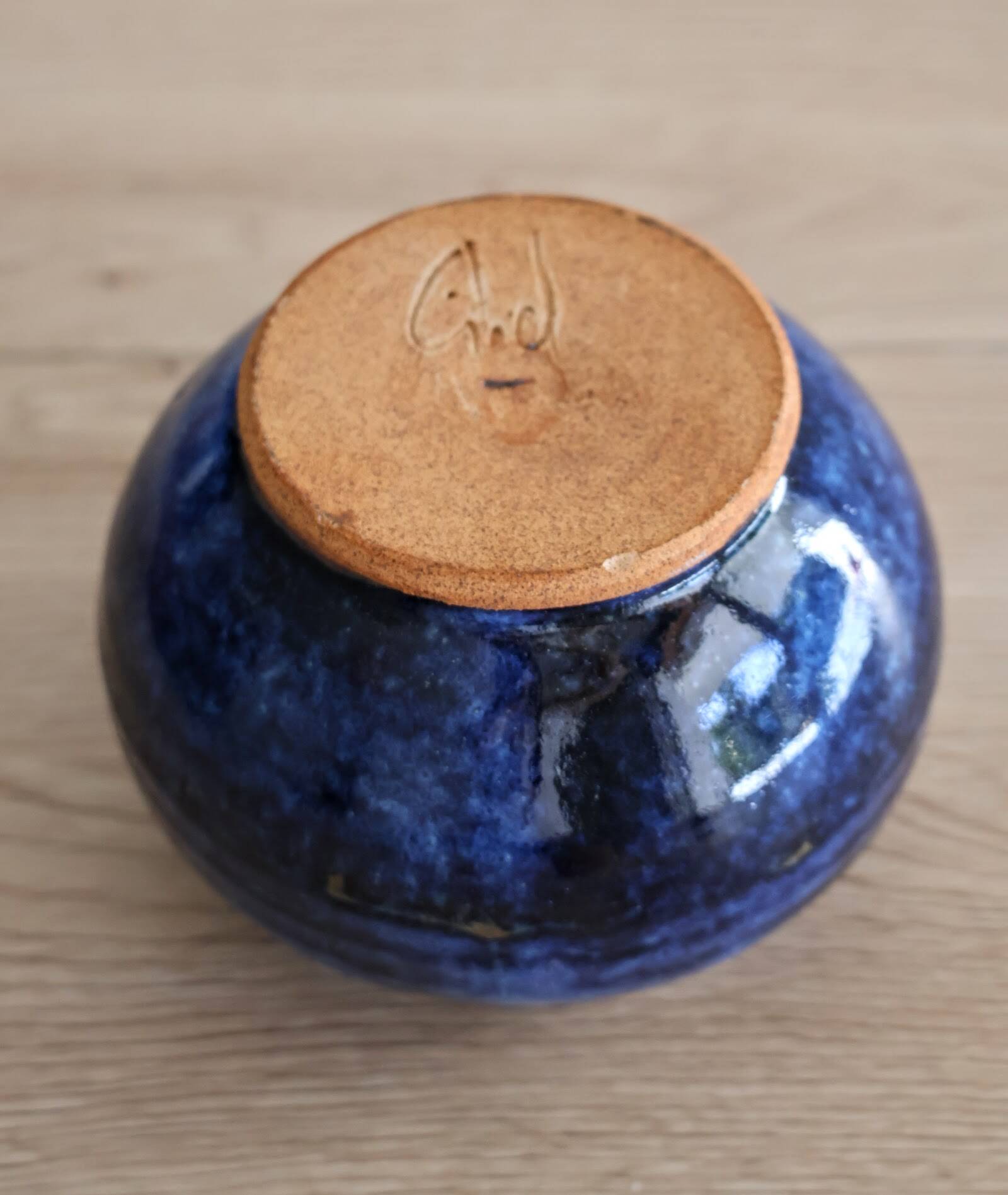 Blue glazed stoneware pot with cork stopper
