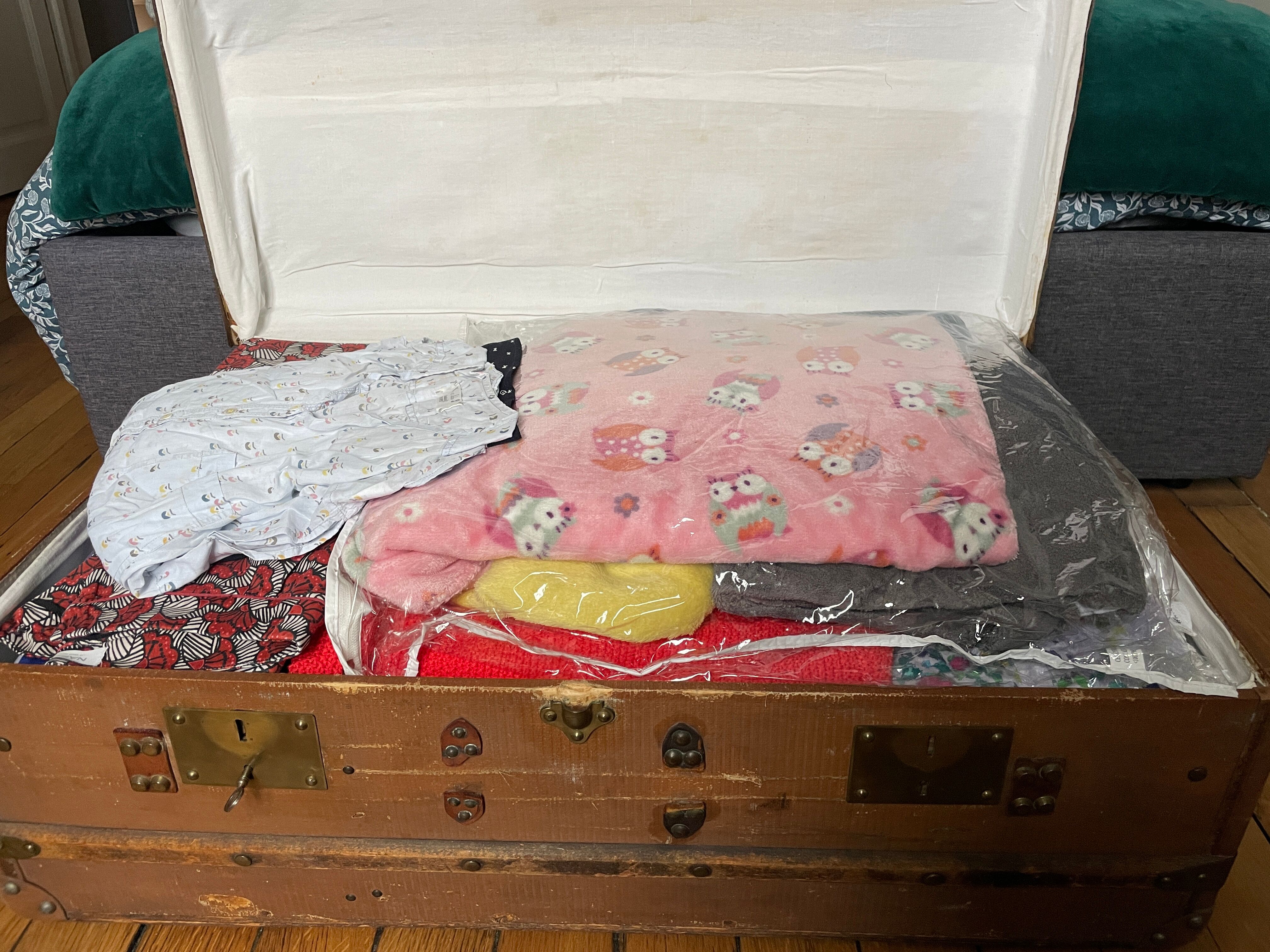 Large antique trunk with a key closure.