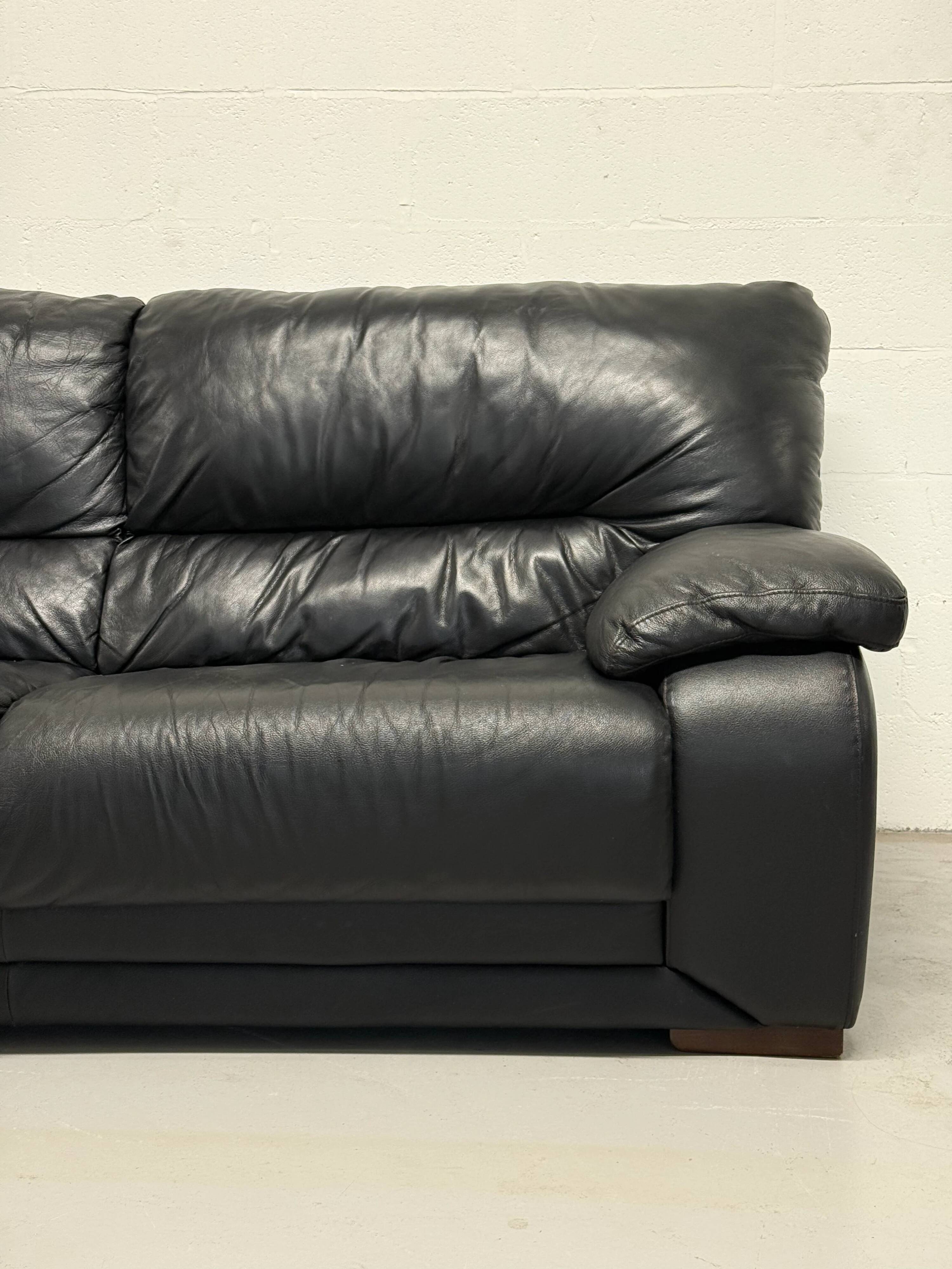 Black leather sofa — Italian postmodern design
