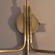 Brass and opaline two-light wall lamp, 1960