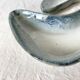 Pair of boomerang dishes signed in enamelled terracotta
