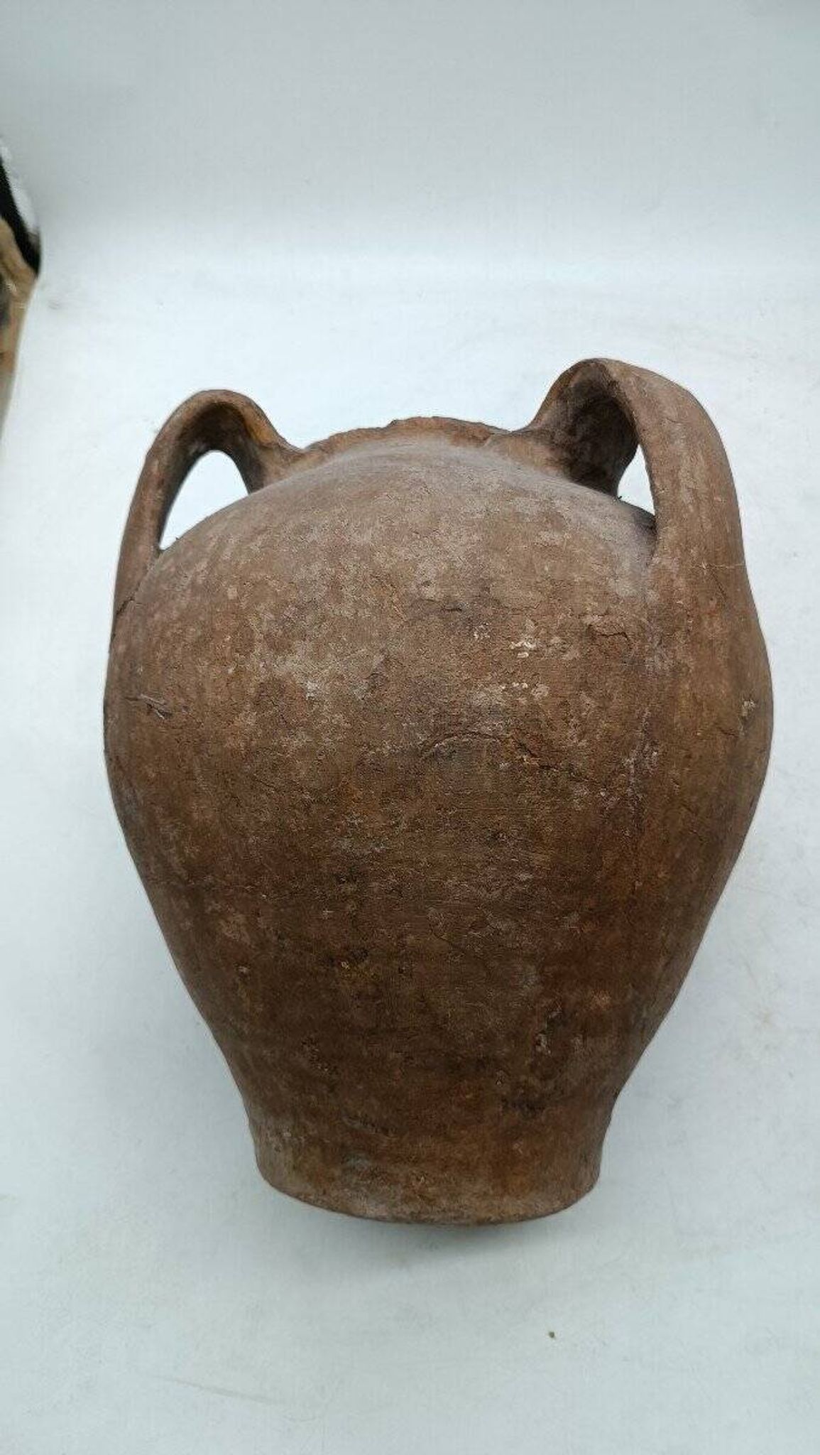 Antique terracotta jug from the 16th century