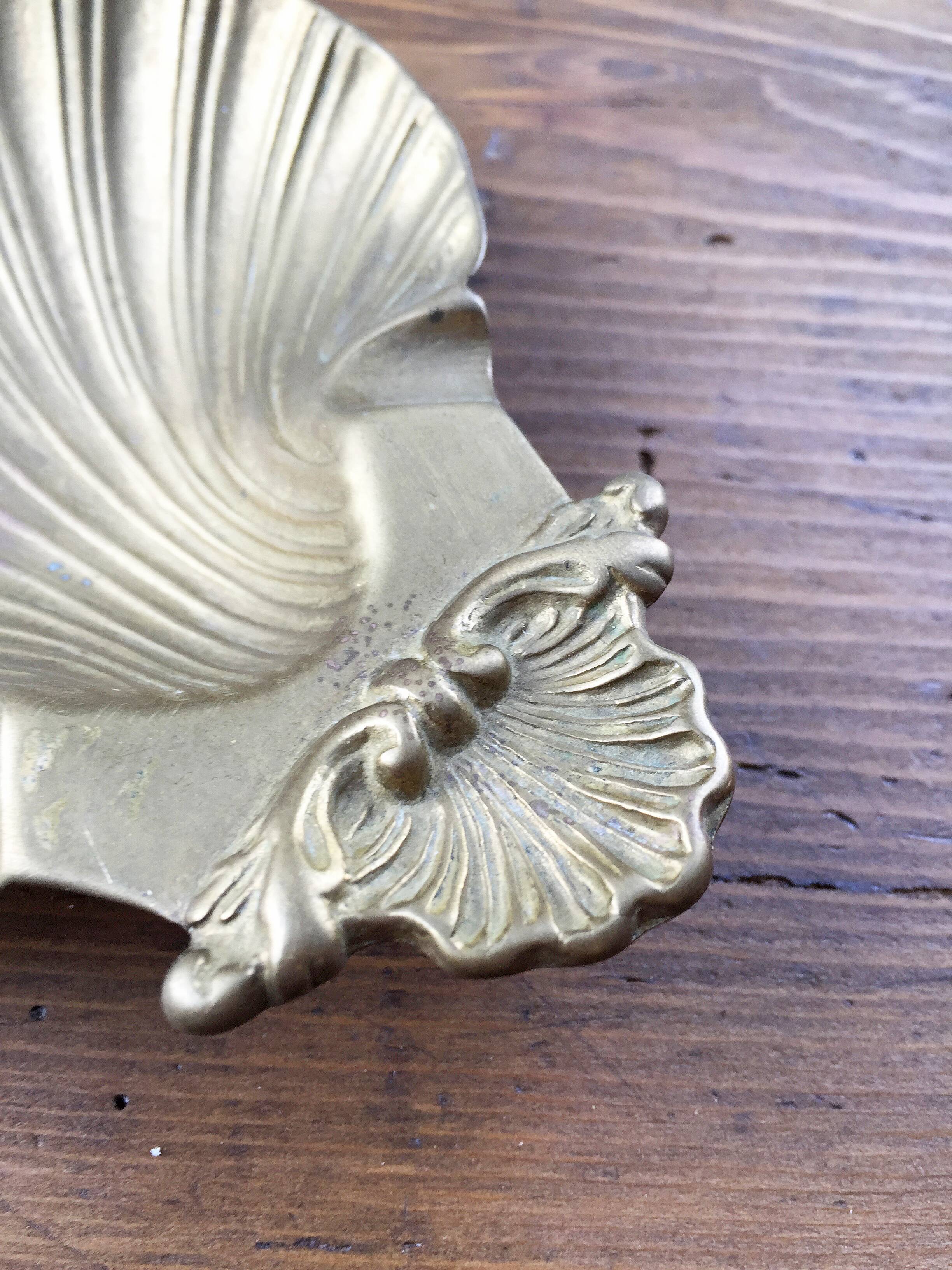Shell brass ashtray