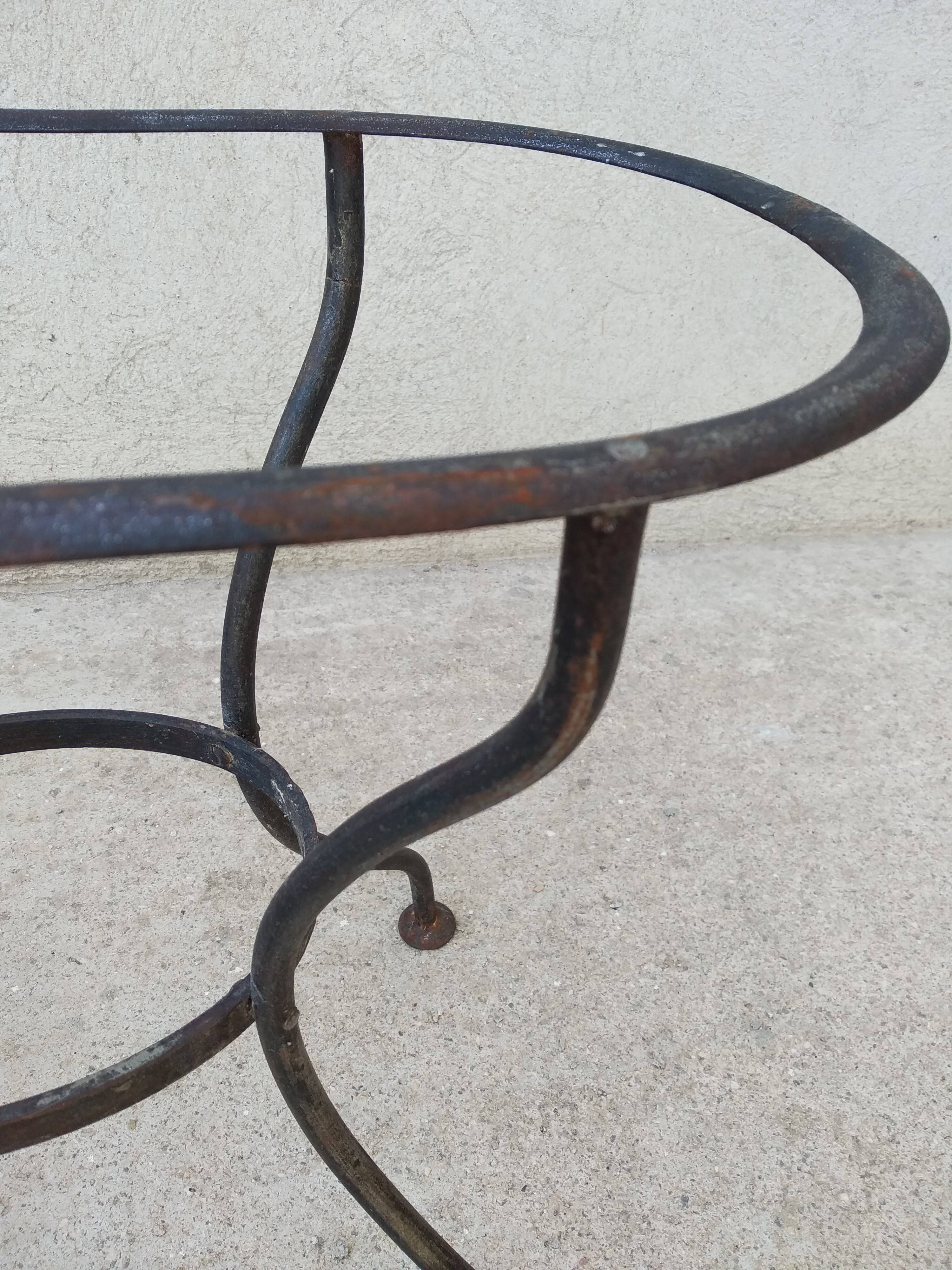 Antique bidet in enamelled sheet metal with wrought iron support