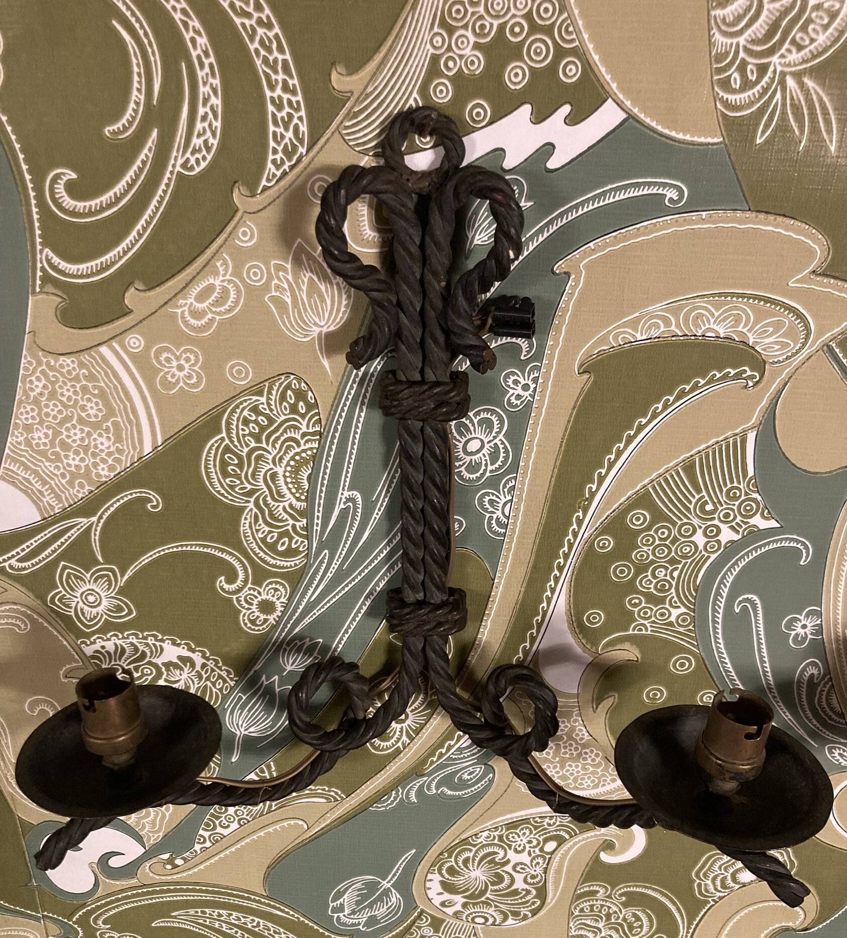 Pair of corded wrought iron wall lights