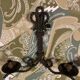 Paire d’appliques en fer forgé cordé