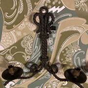 Paire d’appliques en fer forgé cordé