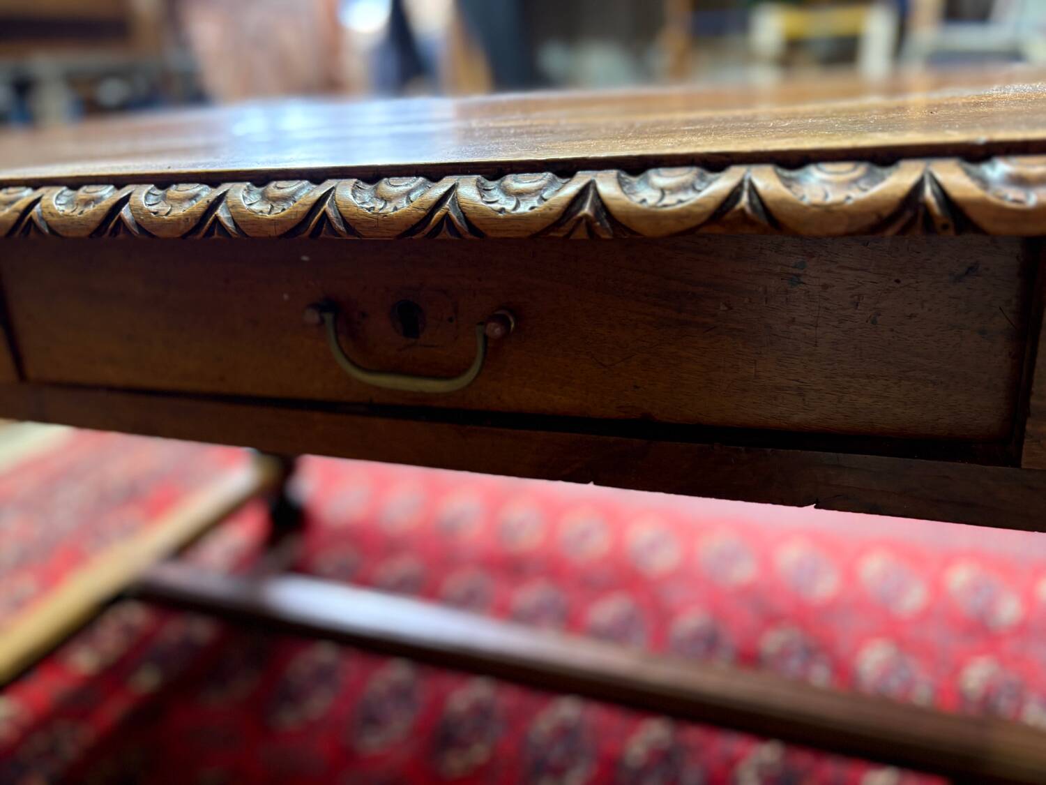 Large antique carved wooden desk in Renaissance style