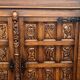 Spanish furniture with carved wood profiles and coats of arms from the 1950s.