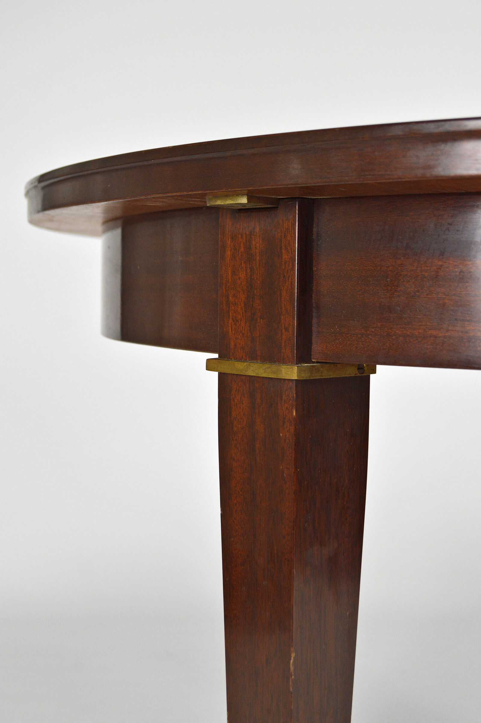 Art Deco mahogany round table by Jacques Adnet around 1940
