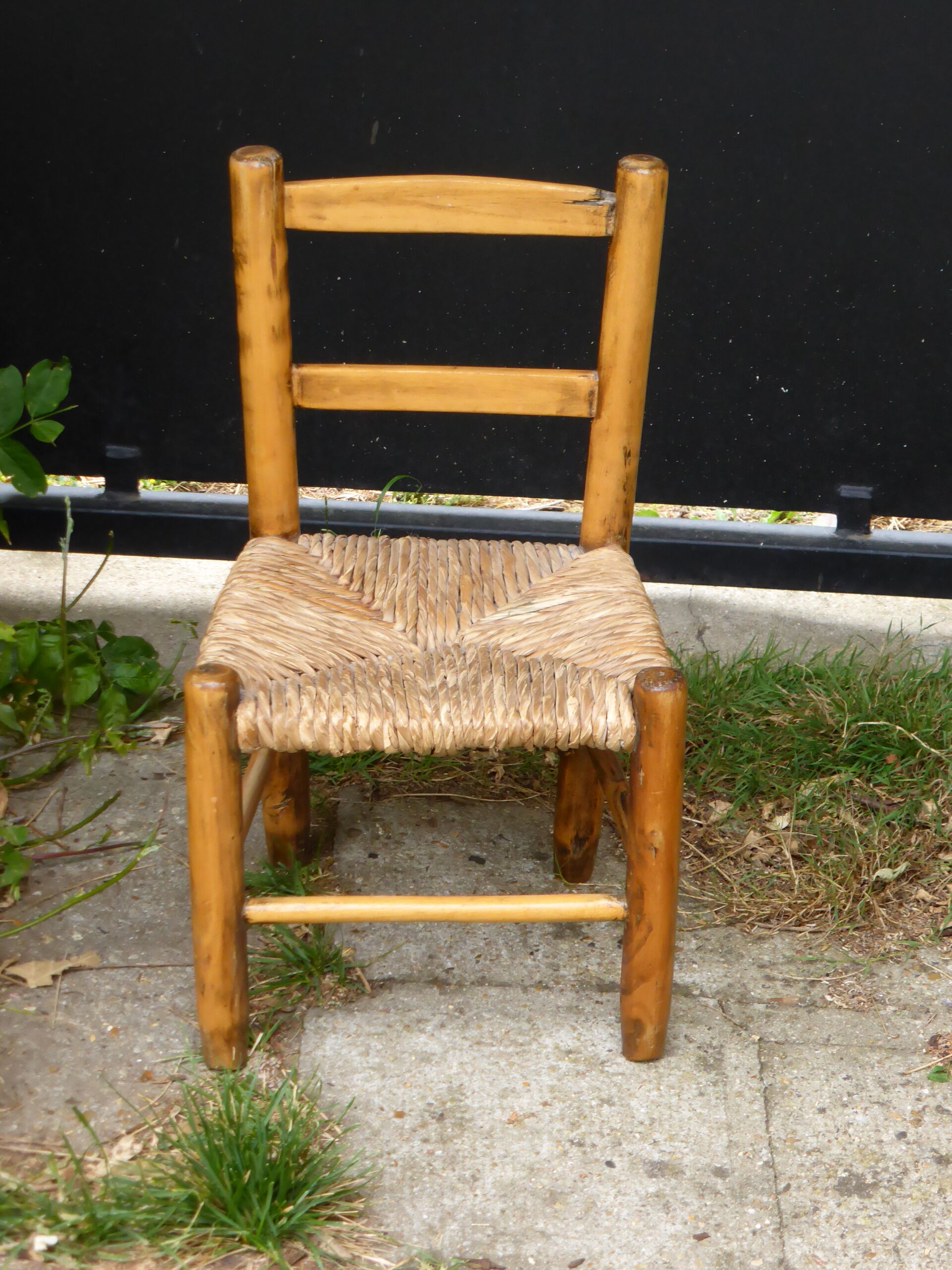 Charming little wooden and straw chair for vintage 1960 children