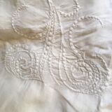 Old sheet in linen embroidered Monogram V M thread.