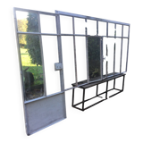 Old glass roof with door and window