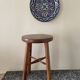Tabouret en bois verni