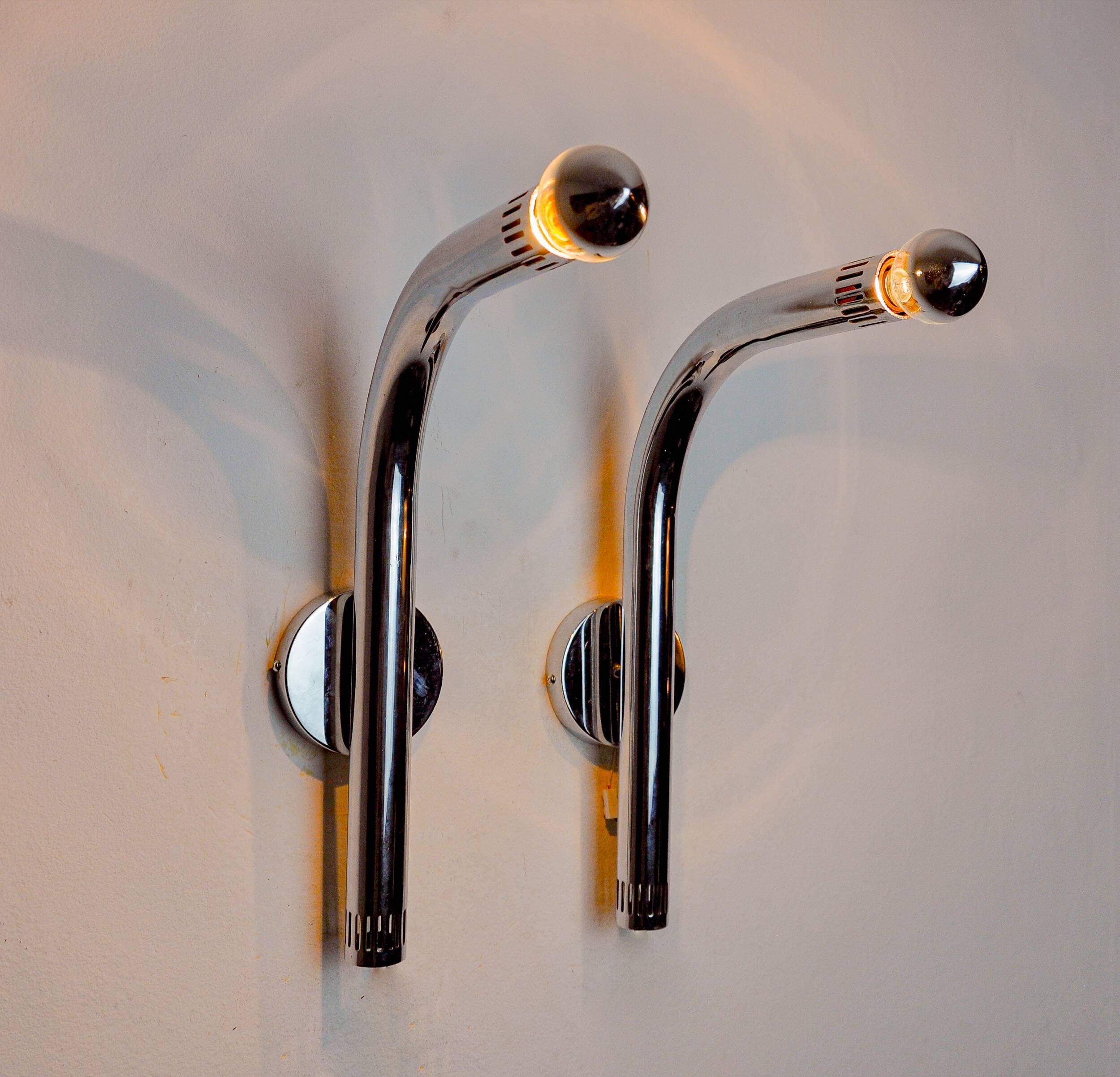 Pair of space-age tubular wall lights, chrome-plated metal, Italy, 1970