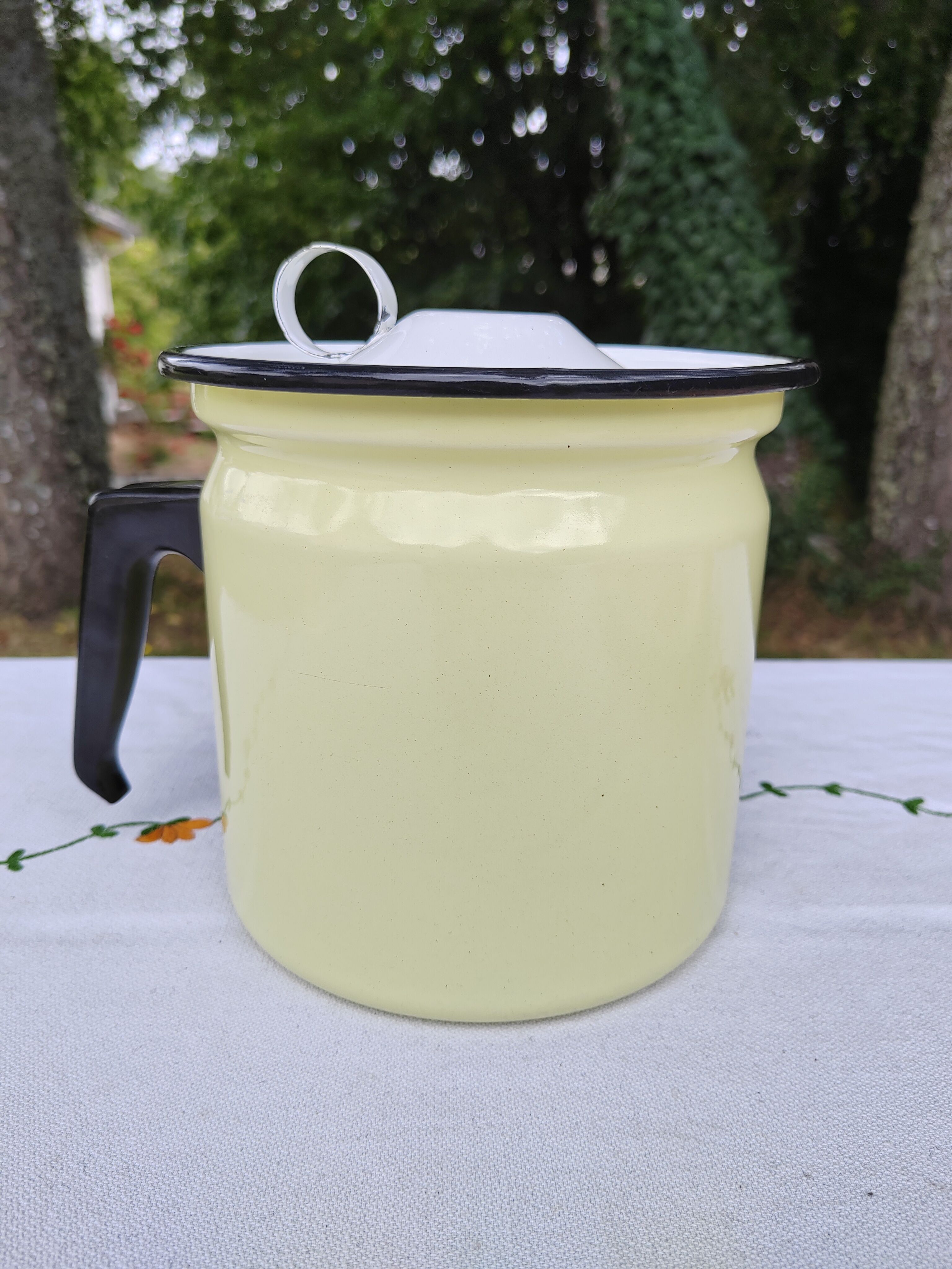 Yellow enamelled milk kettle