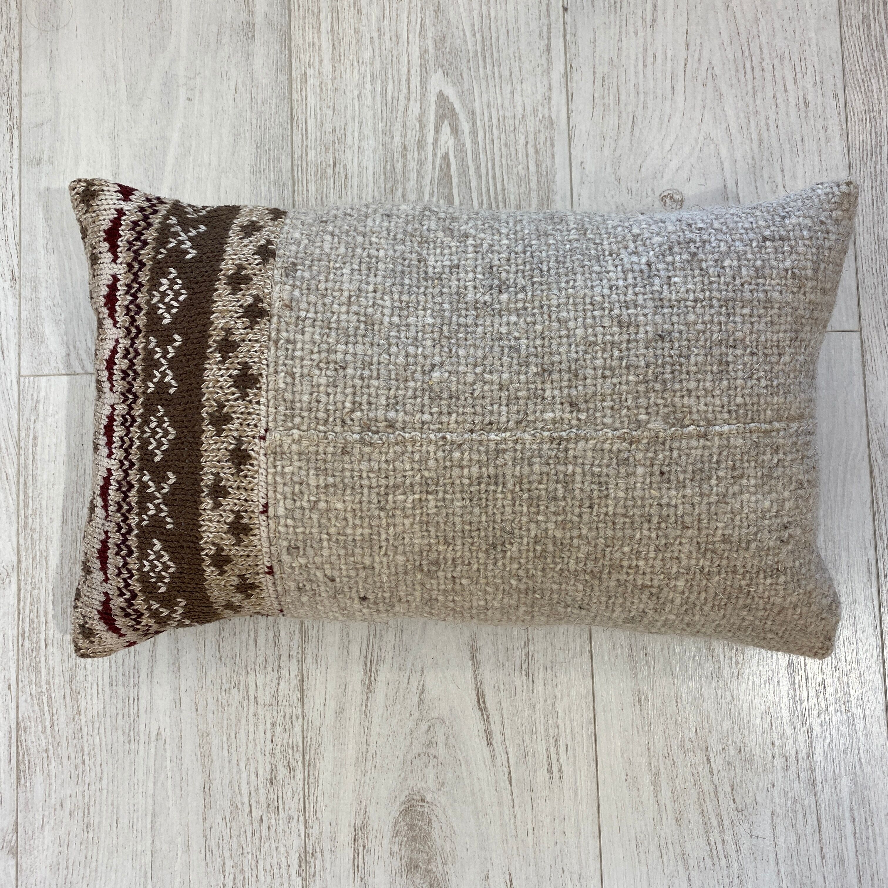 Pair of retro knitted wool cushions