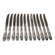 12 silver-plated metal table knives with rocaille ribbon decoration, 25.1 cm