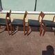 Set of 4 Scandinavian teak chairs in black leather