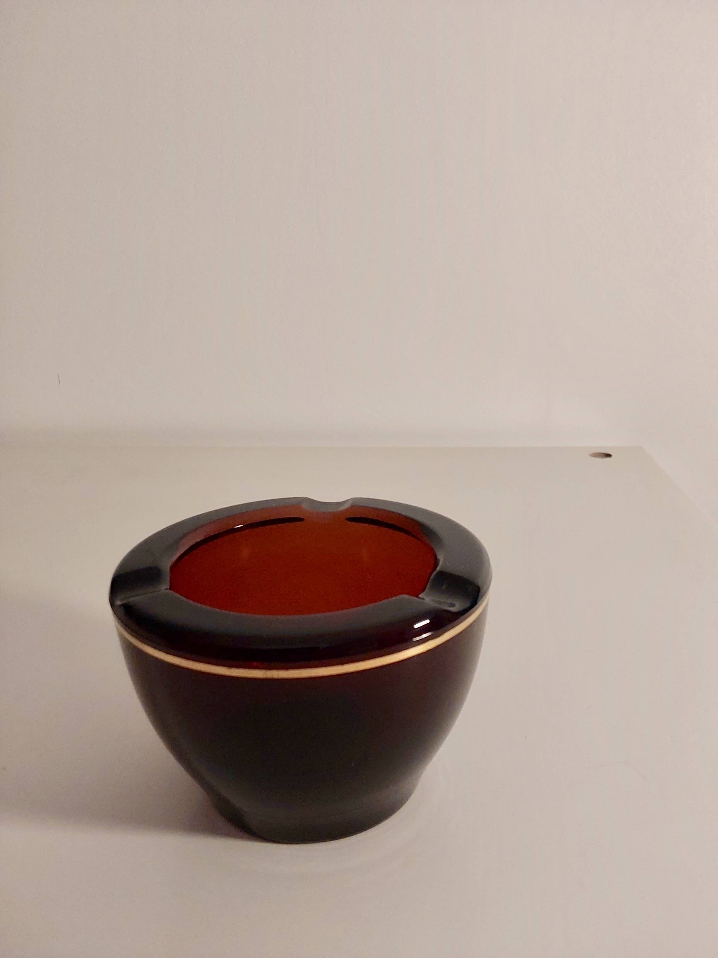Amber glass ashtray