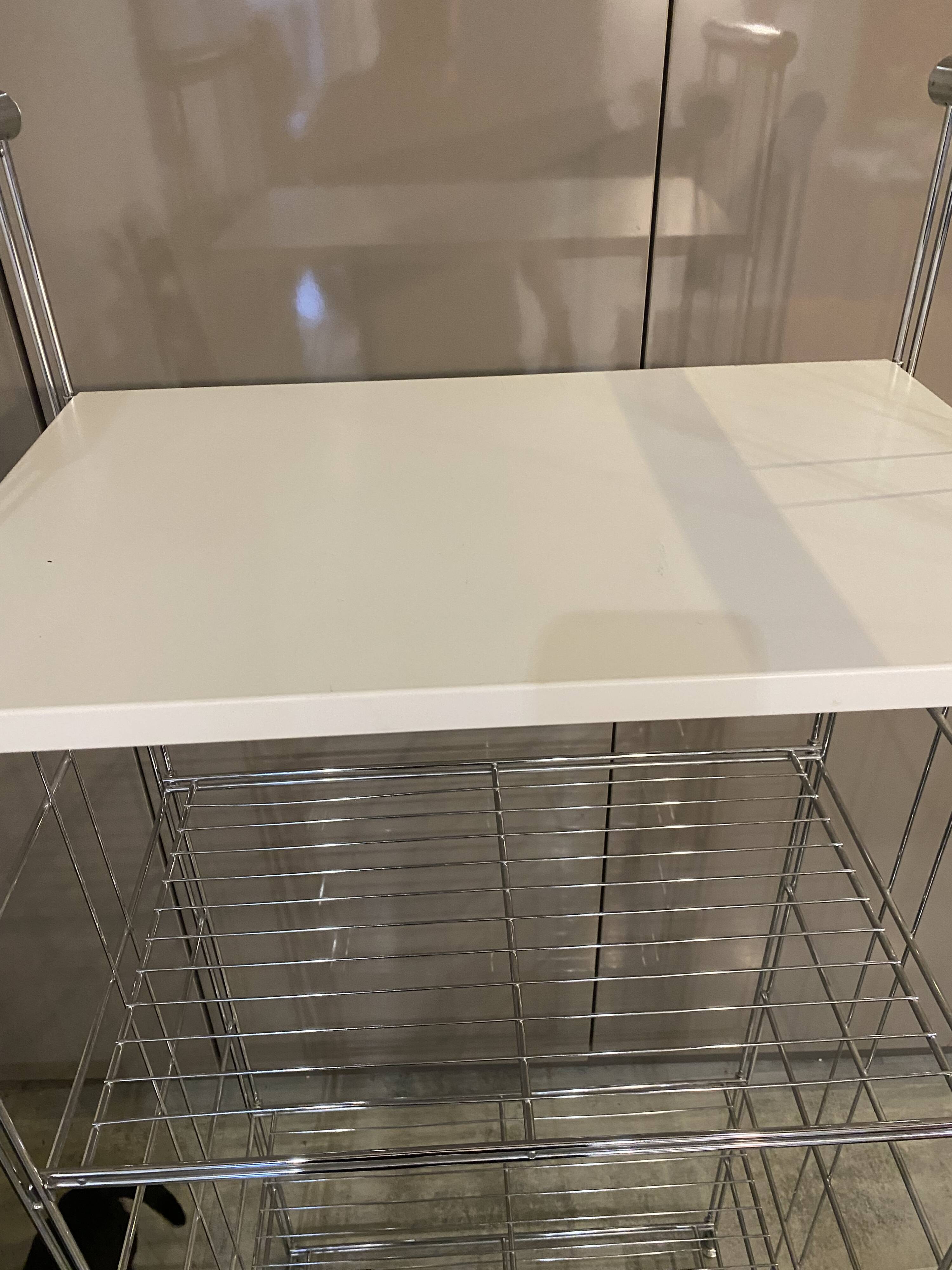 Modular wall bookshelf desk in vintage chrome.