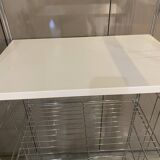 Modular wall bookshelf desk in vintage chrome.