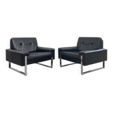 Pair of black leather armchairs