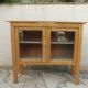 Art Deco sideboard in wood, with 2 glass doors.